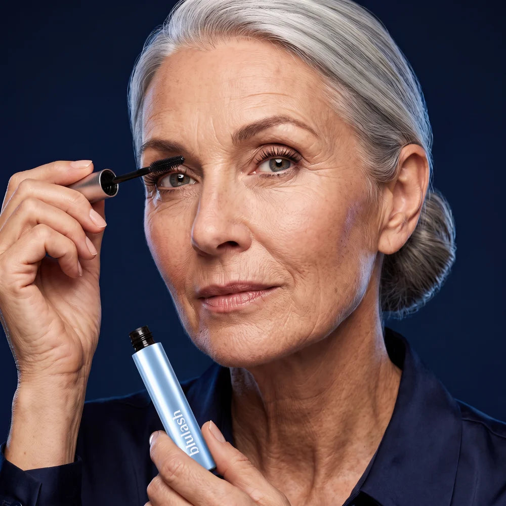 Woman over 50 applying Blulash long-lasting mascara